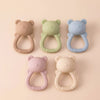 Collection de cinq anneaux de dentition hochets en silicone aux coloris pastel pour bébé - Bébé Lova