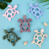 Collection d’anneaux de dentition tortue en plusieurs coloris pastel pour bébé - Bébé Lova