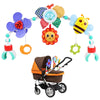 Arche musicale évolutive installée sur une poussette avec jouets suspendus et miroir central - Bébé Lova