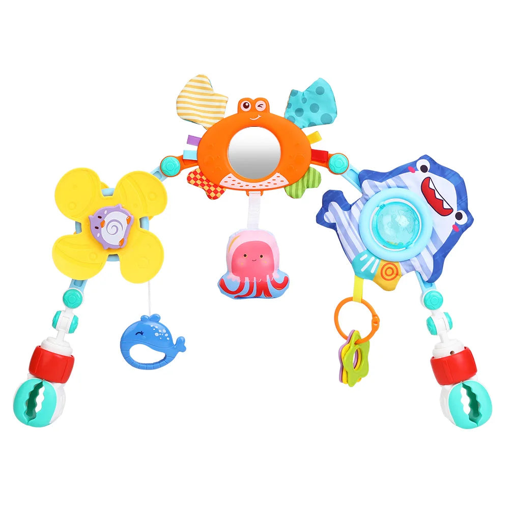 Vue complète de l’arche musicale avec miroir, hochets et jouets suspendus - Bébé Lova