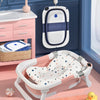Baignoire bébé pliable rose avec coussin ergonomique et capteur de température - Bébé Lova
