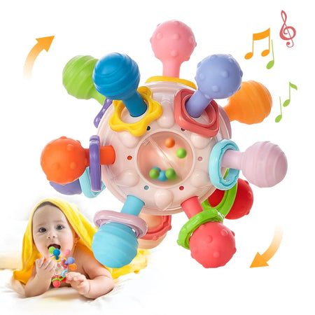 Détail balle de dentition bébé avec billes internes et éléments rotatifs colorés pour stimulation sensorielle - Bébé Lova