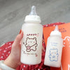 Biberon bébé blanc avec motif ourson kawaii et tétine souple - Bébé Lova