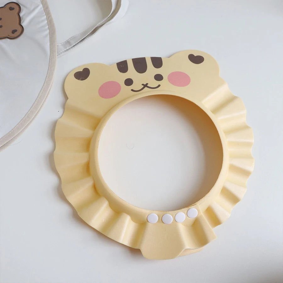 Bonnet de bain bébé motif chat beige pour protéger les yeux durant le shampoing - Bébé Lova
