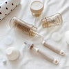 Brosse pour biberon insérée dans un biberon avec brosse pour tétine et accessoires de nettoyage - Bébé Lova