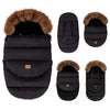 Chancelière évolutive CozyNest noire et ses configurations : tablier amovible et col fourrure détachable - Bébé Lova