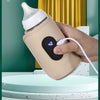 Chauffe-biberon portable USB branché pour réchauffer le lait de bébé - Bébé Lova