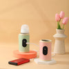 Chauffe-biberon portable USB disponible en version verte et rose - Bébé Lova