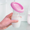 Collecteur SiliCollect rempli lait couvercle rose silicone souple - Bébé Lova