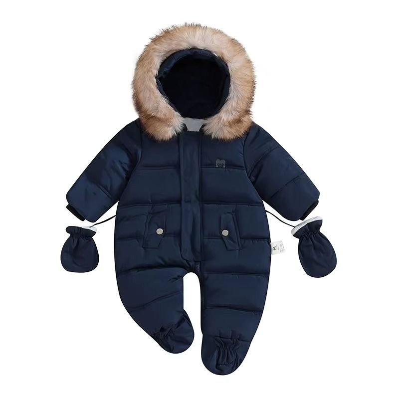 Combinaison pilote bébé bleu marine à capuche fourrée, pieds intégrés et moufles assorties, présentée de face - Bébé Lova