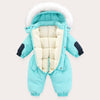 Combinaison de ski bébé turquoise ouverte montrant l'épaisse doublure polaire - Bébé Lova