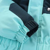 Gros plan sur le poignet élastiqué de la combinaison de ski bébé turquoise - Bébé Lova