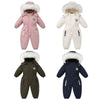 Combinaison de ski bébé présentée en quatre coloris : rose, écru, kaki et bleu marine - Bébé Lova
