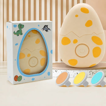 Coupe-ongles électrique bébé en forme d’œuf dinosaure avec coffret et 3 têtes de polissage colorées pour un limage sécurisé des ongles - Bébé Lova