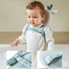 Bébé portant un coussin anti-chute bleu avec bretelles réglables - Bébé Lova