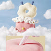 Coussin anti-chute rose avec ailes présenté dans des nuages - Bébé Lova