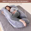 Femme enceinte dormant sur le côté enlacée par le coussin de grossesse GPillow gris - Bébé Lova