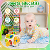 Bébé jouant avec cube éducatif BusyCube Montessori, développement motricité fine, coordination œil-main et exploration - Bébé Lova