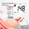 Femme enceinte utilisant un doppler fœtal précis pour surveiller le rythme cardiaque du bébé - Bébé Lova