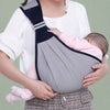 Bébé endormi dans l'écharpe de portage BabySling grise confortable et sécurisée - Bébé Lova