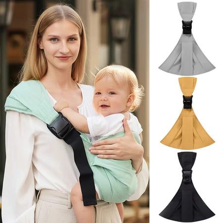 Maman portant son bébé dans l'écharpe sling menthe, déclinée en gris, jaune et noir - Bébé Lova