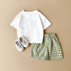 Vue arrière de l’ensemble bébé avec short vert à carreaux - Bébé Lova