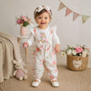 Petite fille de 12 mois portant l’ensemble fleuri avec motif lapin, bandeau assorti et chaussures blanches - Bébé Lova