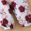 Détail du pantalon imprimé avec lapins et fleurs bordeaux - Bébé Lova