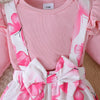 Détail du haut rose côtelé avec combinaison imprimée de papillons roses - Bébé Lova