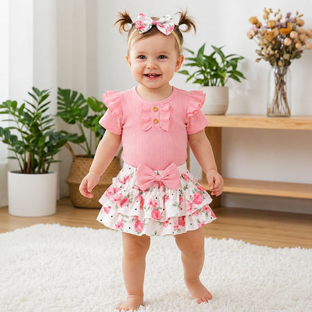 Ensemble été bébé fille body rose et bloomer fleuri porté par bébé - Bébé Lova