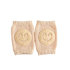 Paire de genouillères bébé beige doux avec protection antidérapante - Bébé Lova