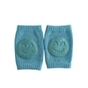 Paire de genouillères bébé vert menthe avec motif sourire - Bébé Lova