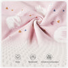 Gros plan sur le tissu respirant et absorbant de la gigoteuse bébé en coton - Bébé Lova