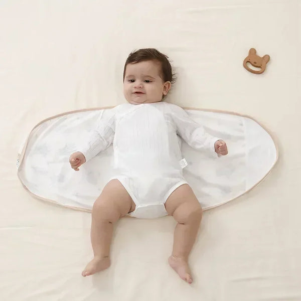 Bébé apaisé gigoteuse SnugWrap bras tendus réflexe Moro calmé - Bébé Lova