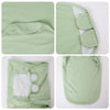 Détails de la gigoteuse verte en coton avec attaches velcro et finitions douces - Bébé Lova