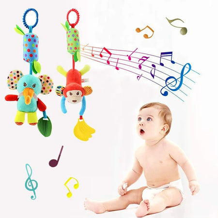 Bébé découvrant des hochets suspendus musicaux avec animaux colorés et notes de musique - Bébé Lova