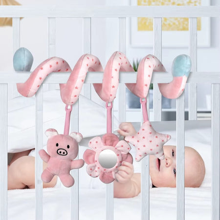 Jouet spiral musical rose SpiralPlay accroché à un berceau bébé avec peluche douce et étoile suspendue - Bébé Lova