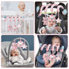 Jouet spiral musical SpiralPlay utilisé sur berceau, siège auto, transat et poussette pour éveil bébé - Bébé Lova