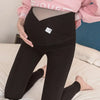 CotLegging legging noir V-cross femme enceinte vue face ventre bas - Bébé Lova