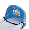 Détail intérieur du lit bébé pliable avec moustiquaire et jouets suspendus intégrés - Bébé Lova