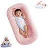 Bébé allongé dans un coussin nid bébé rose doux et confortable pour nouveau-né - Bébé Lova