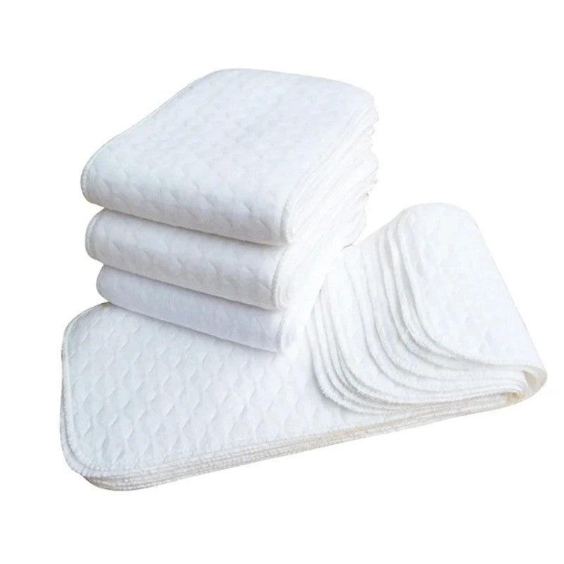 Vue produit du lot de 10 couches lavables pliables en coton blanc absorbant - Bébé Lova