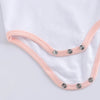 Fermeture à boutons pression métalliques pour un habillage facile de bébé - Bébé Lova