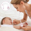 Version rose du mouche-bébé manuel présentée en situation d'utilisation - Bébé Lova