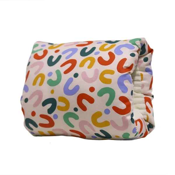 Oreiller bras ArmCradle packshot motif U formes multicolores coton allaitement - Bébé Lova