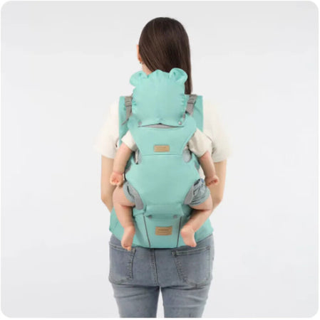 Maman vue de dos portant son bébé sur le dos avec le porte-bébé 3 en 1 turquoise - Bébé Lova
