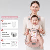 Porte-bébé KangaBaby coloris rose porté par une maman, avec les accessoires bavoirs, puce et boîte cadeau offerts - Bébé Lova