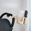 Porte-gobelet de poussette universel beige sur un guidon avec gobelet et téléphone - Bébé Lova