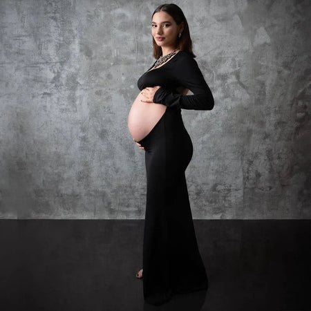 Robe SquareDress noire vue profil ventre apparent décor mur béton - Bébé Lova