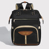 Sac à dos à langer noir multifonction PackaMom avec poches zippées et finitions dorées - Bébé Lova